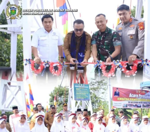Ketua DPRD Hutri Randa Hadiri Peresmian Jembatan Perintis Garuda Desa Mekar Jaya